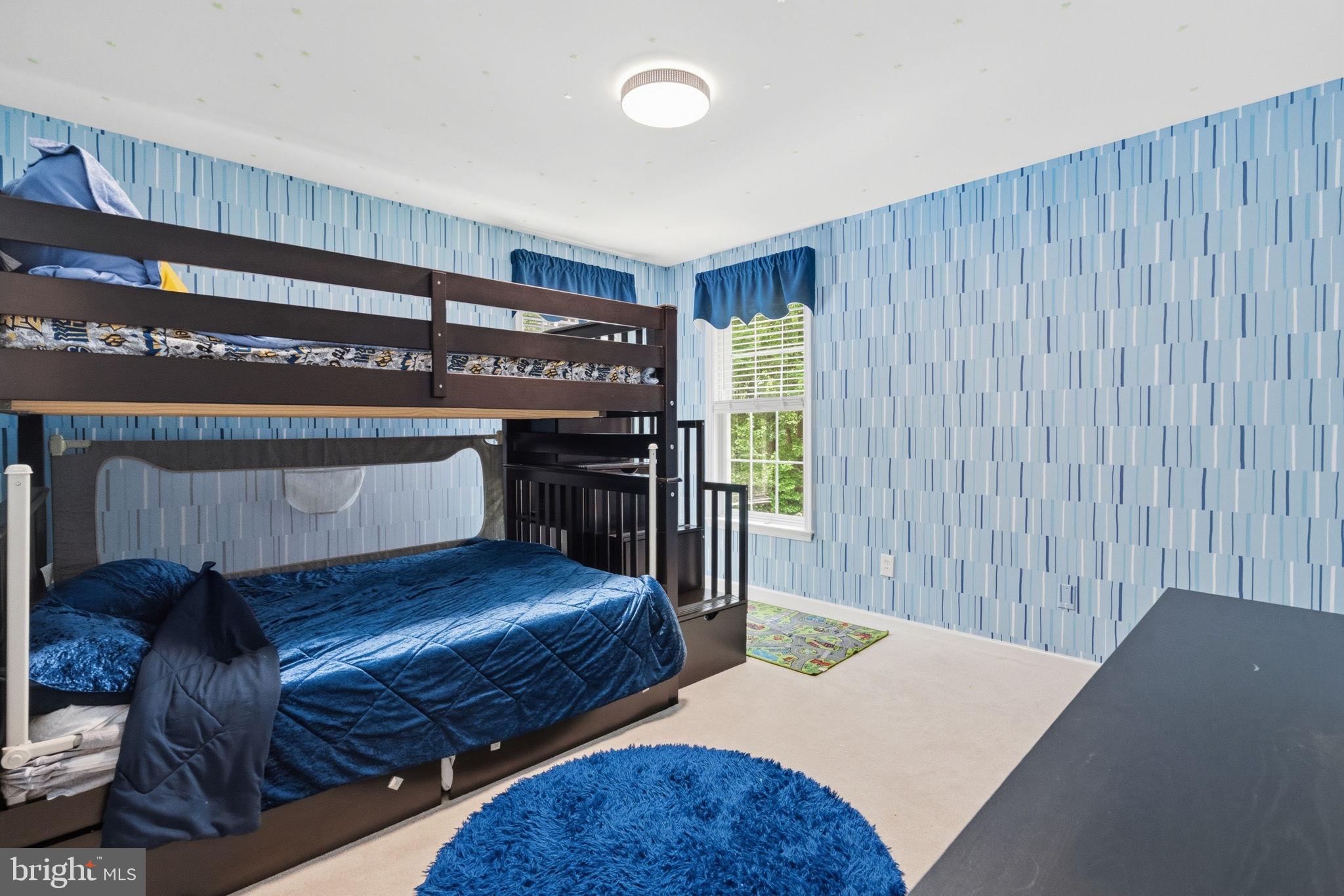 1350 Skelp Level Road Downingtown, PA 19335 - Photo 28 of 50 a bedroom with furniture and a book shelf