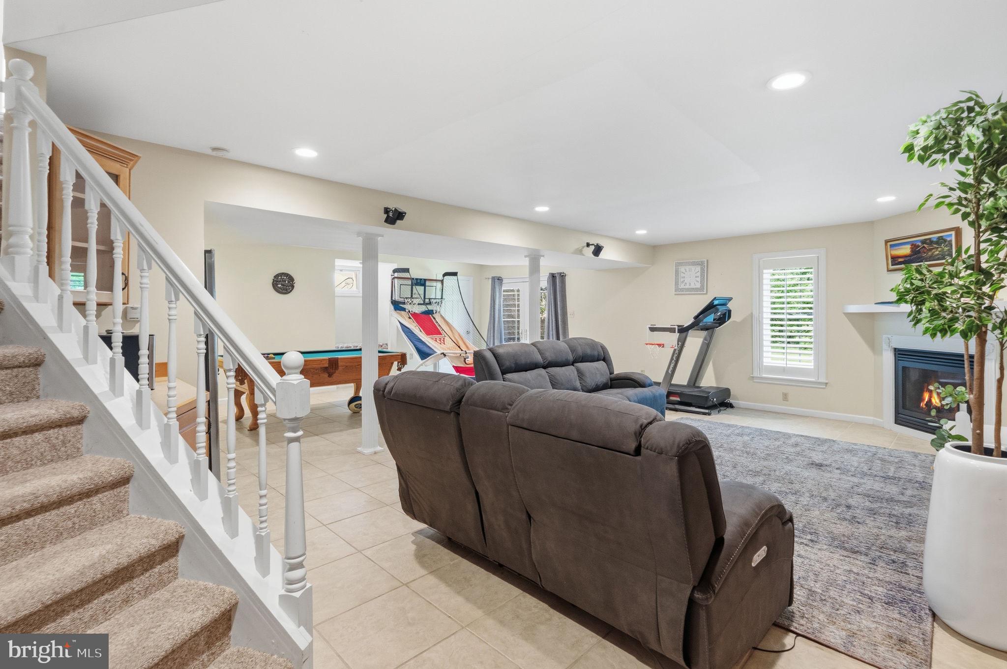 1350 Skelp Level Road Downingtown, PA 19335 - Photo 31 of 50 a living room with furniture and a fireplace