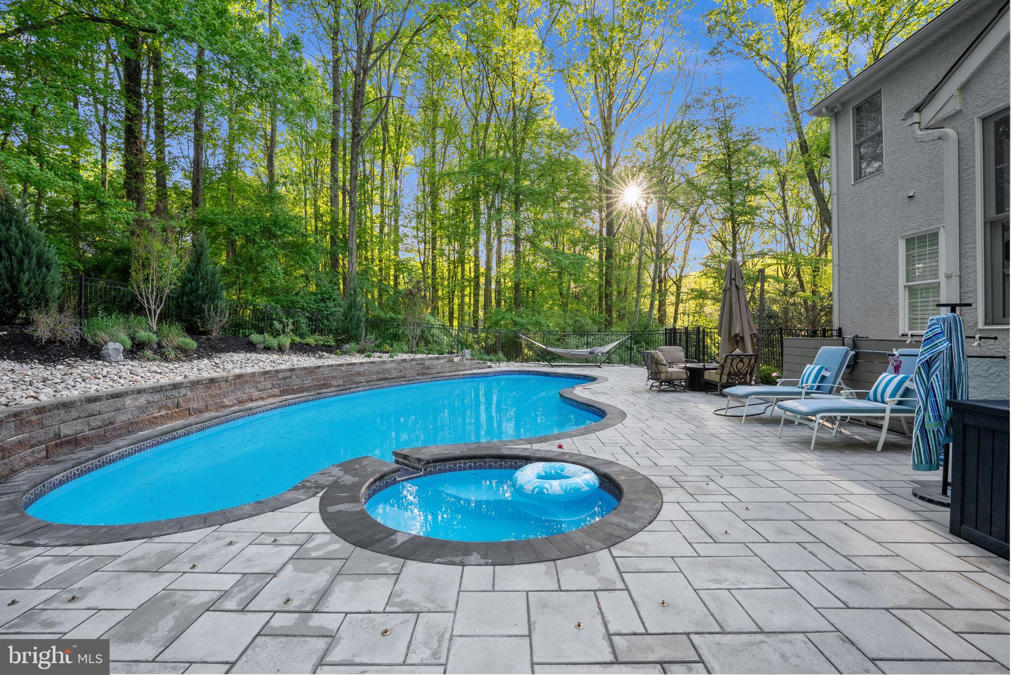 1350 Skelp Level Road Downingtown, PA 19335 - Photo 35 of 50 a view of a swimming pool with lounge chair
