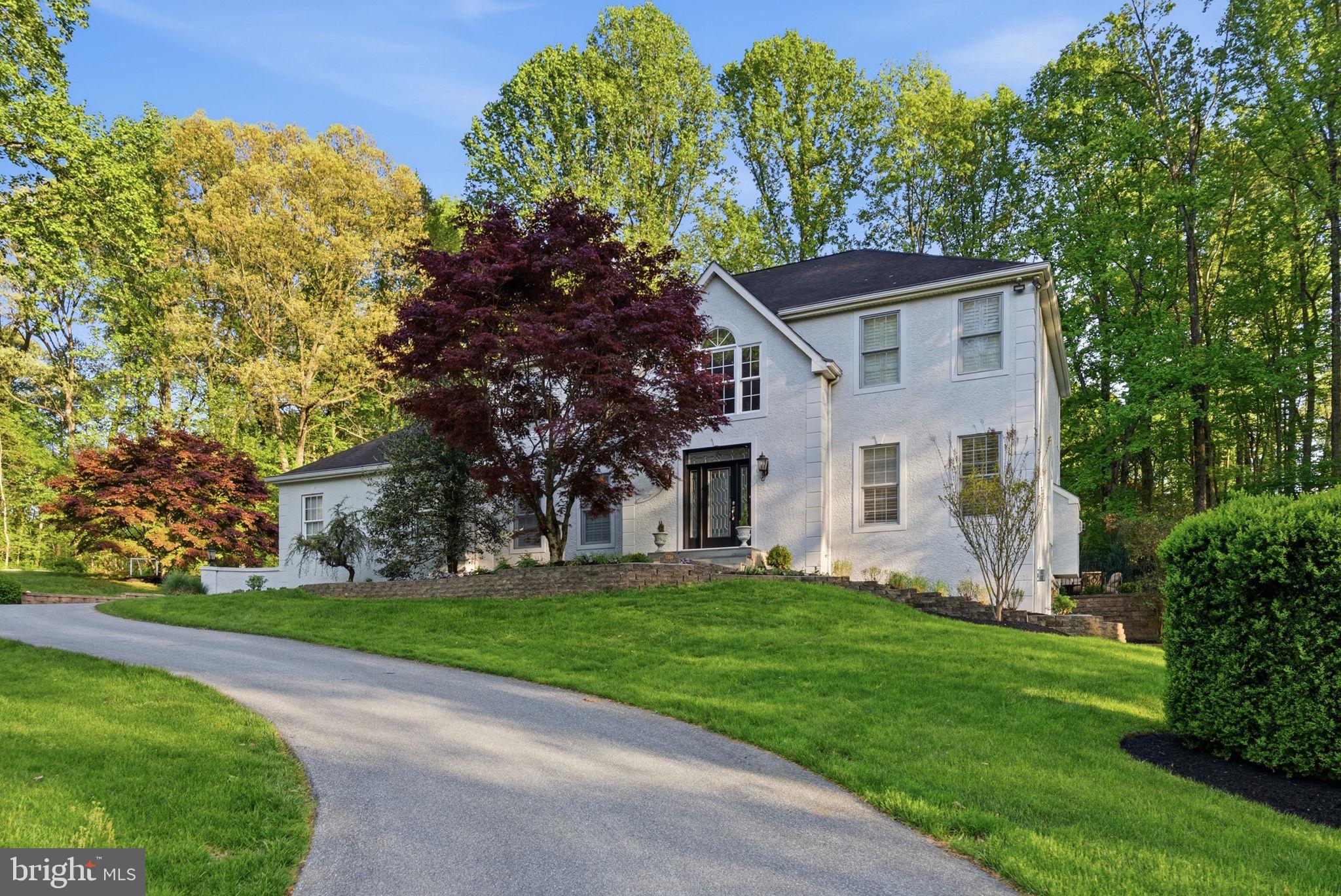 1350 Skelp Level Road Downingtown, PA 19335 - Photo 42 of 50 a front view of house with yard and green space