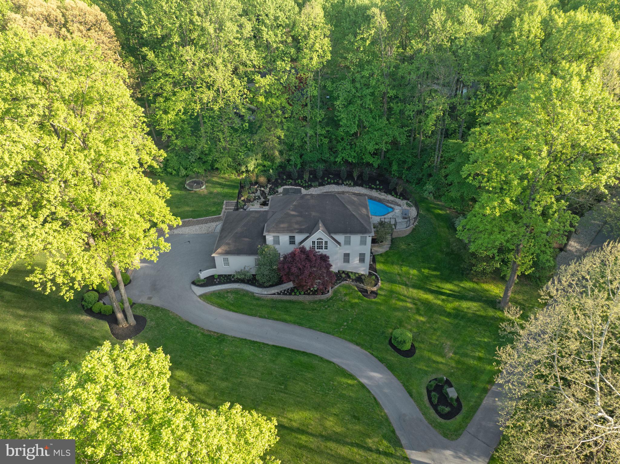1350 Skelp Level Road Downingtown, PA 19335 - Photo 44 of 50 a view of an outdoor space with a garden