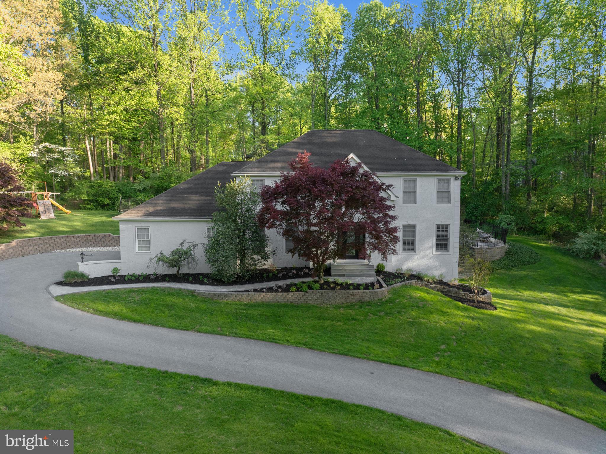 1350 Skelp Level Road Downingtown, PA 19335 - Photo 47 of 50 a view of a house with a yard porch and sitting area