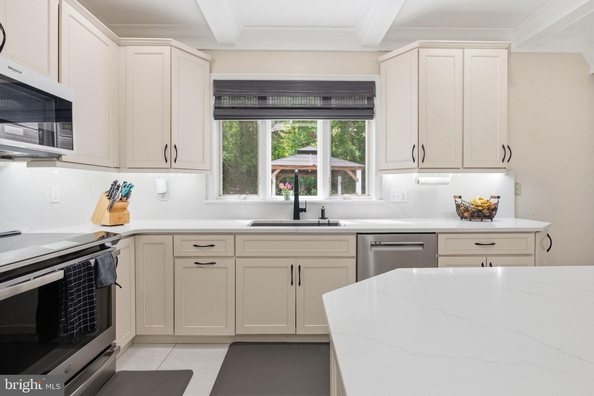 1350 Skelp Level Road Downingtown, PA 19335 - Photo 10 of 50 a kitchen with cabinets appliances and a window