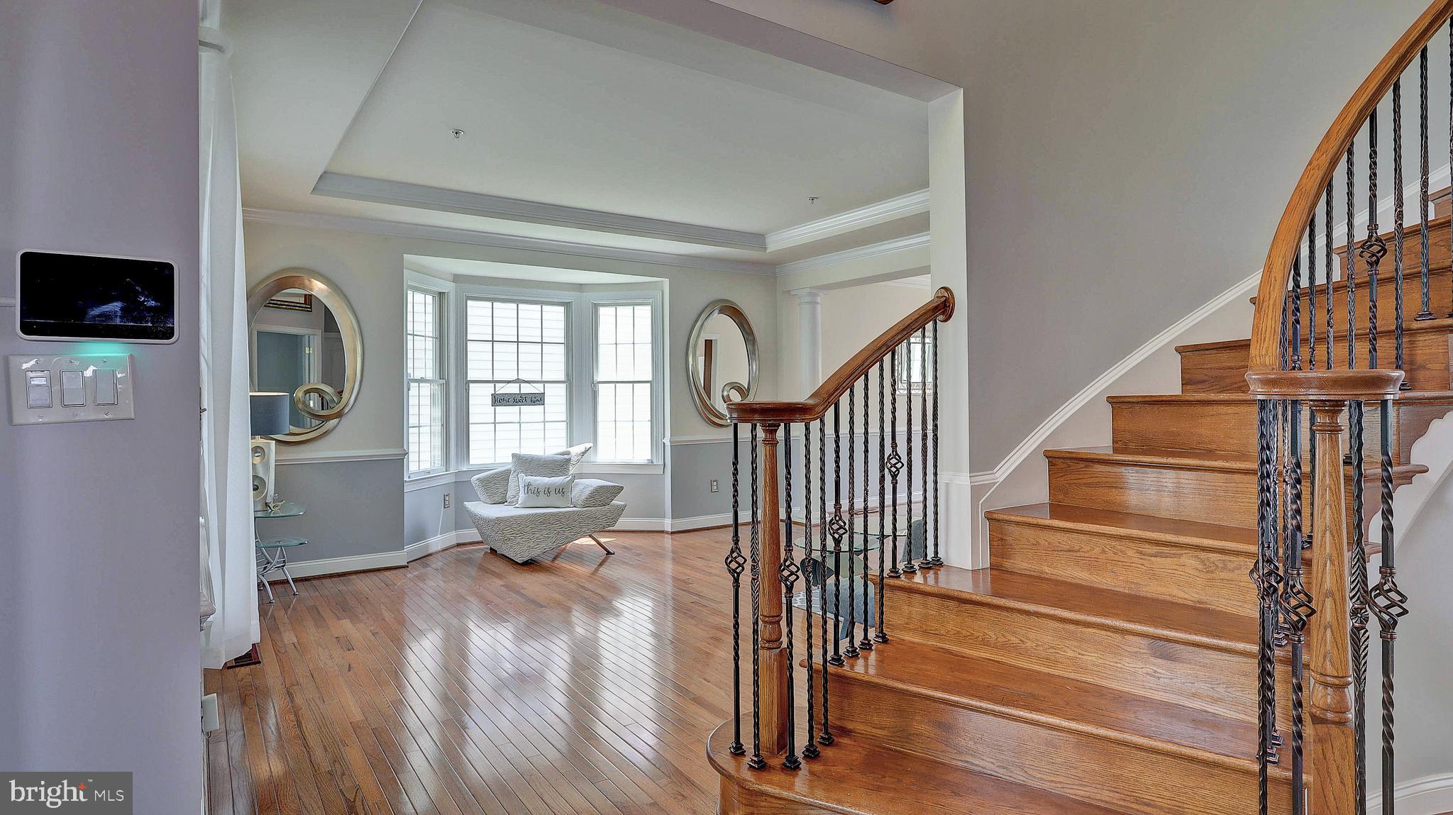11303 Marlboro Ridge Road Upper Marlboro, MD 20772 - Photo 5 of 51 Foyer to Living room, curved stairs
