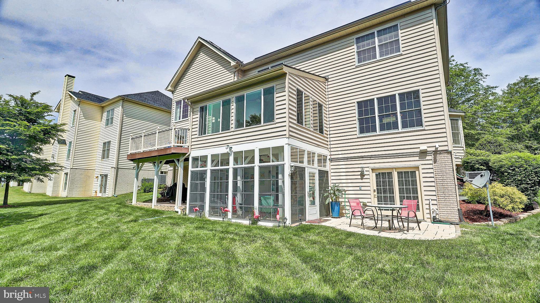 11303 Marlboro Ridge Road Upper Marlboro, MD 20772 - Photo 47 of 51 Exterior yard with 2 patios and Enclosed sunroom