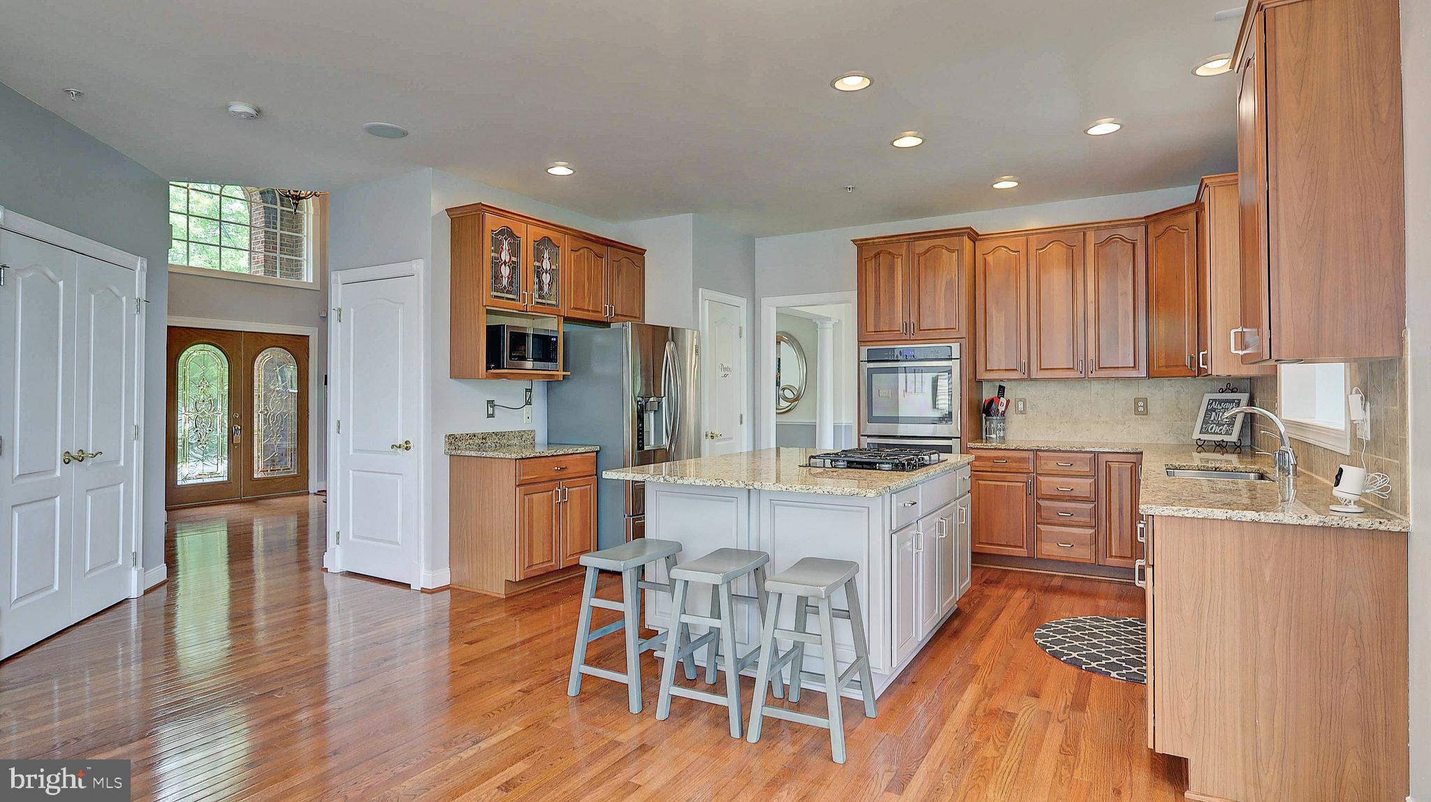 11303 Marlboro Ridge Road Upper Marlboro, MD 20772 - Photo 7 of 51 Gourmet Kitchen with granite Island and Cooktop