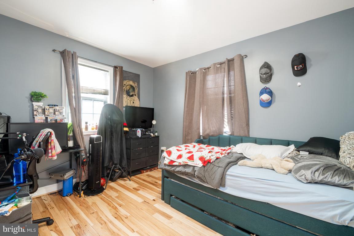1710 Bargers Road Gambrills, MD 21054 - Photo 16 of 22 a bedroom with a bed and a window