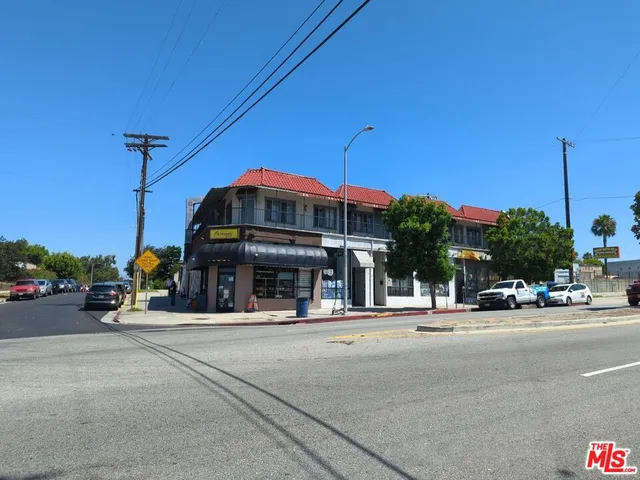 a view of a street with cars