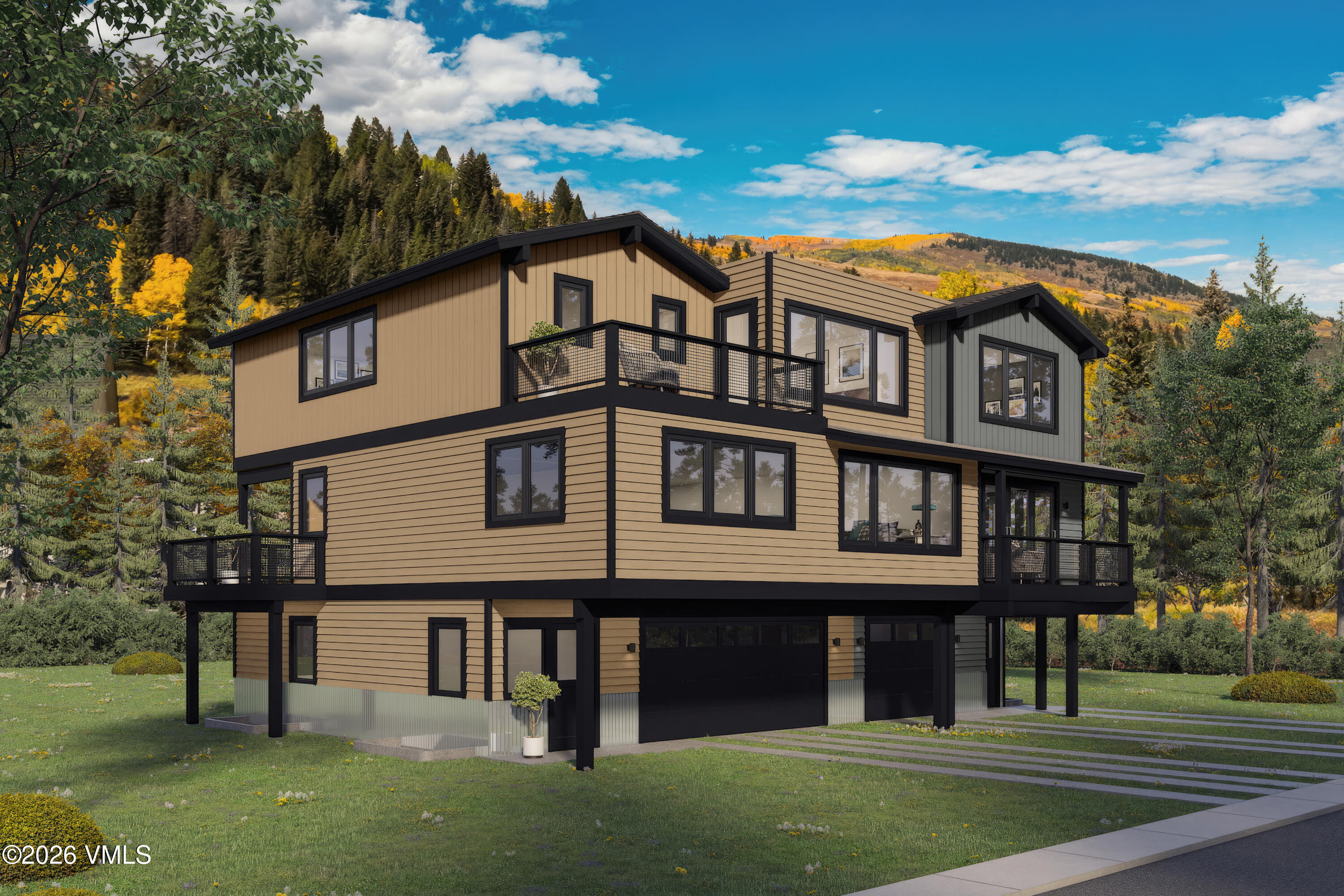 29 Belden Way Minturn, CO 81645 - Photo 2 of 4 a view of a white house with a large windows and a yard