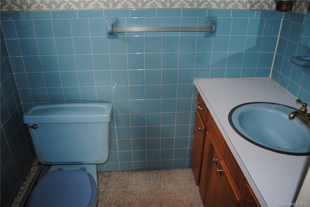 278 York Road Stony Point, NC 28678 - Photo 14 of 21 a bathroom with a sink and a toilet