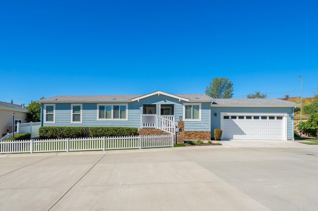 a house view with a garden space