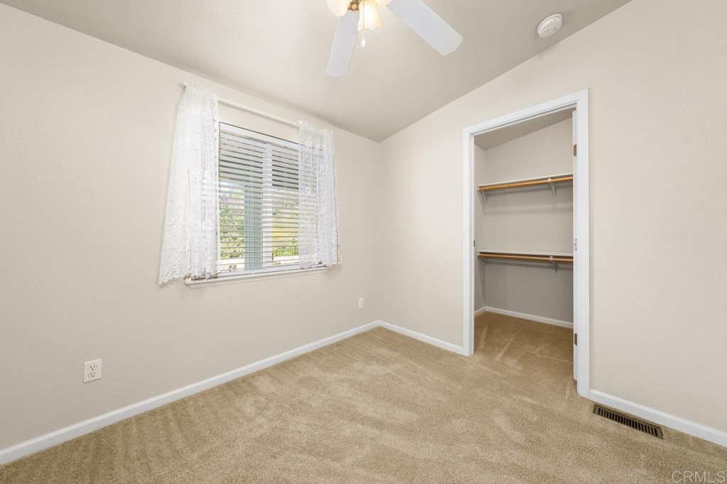 2400 Alpine Boulevard, Unit SPC 155 Alpine, CA 91901 - Photo 11 of 15 a view of an empty room with a window