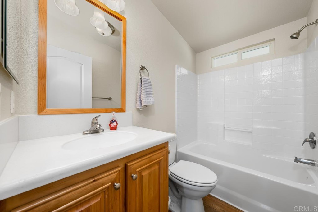 2400 Alpine Boulevard, Unit SPC 155 Alpine, CA 91901 - Photo 13 of 15 a bathroom with a sink a toilet and a bathtub