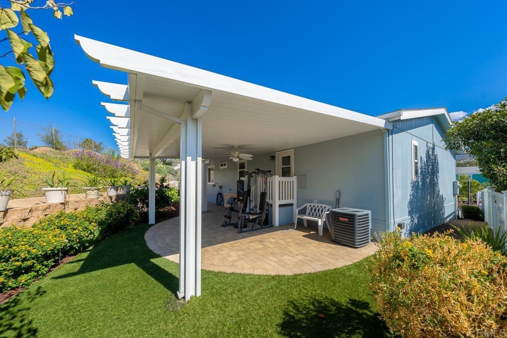 2400 Alpine Boulevard, Unit SPC 155 Alpine, CA 91901 - Photo 15 of 15 a view of a patio with table and chairs and potted plants