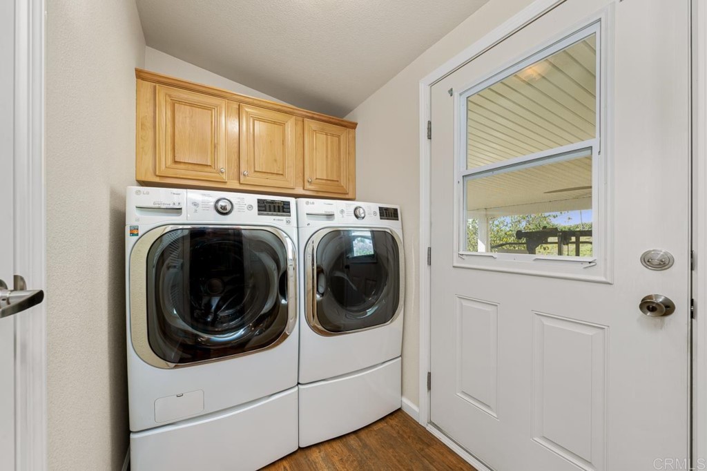 2400 Alpine Boulevard, Unit SPC 155 Alpine, CA 91901 - Photo 7 of 15 a utility room with dryer and washer