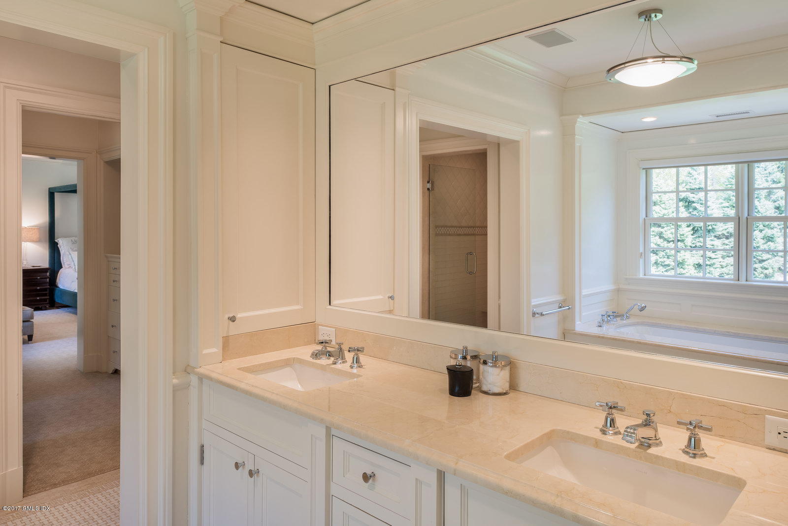 9 Roberta Lane Greenwich, CT 06830 - Photo 11 of 25 a bathroom with double sink and a mirror