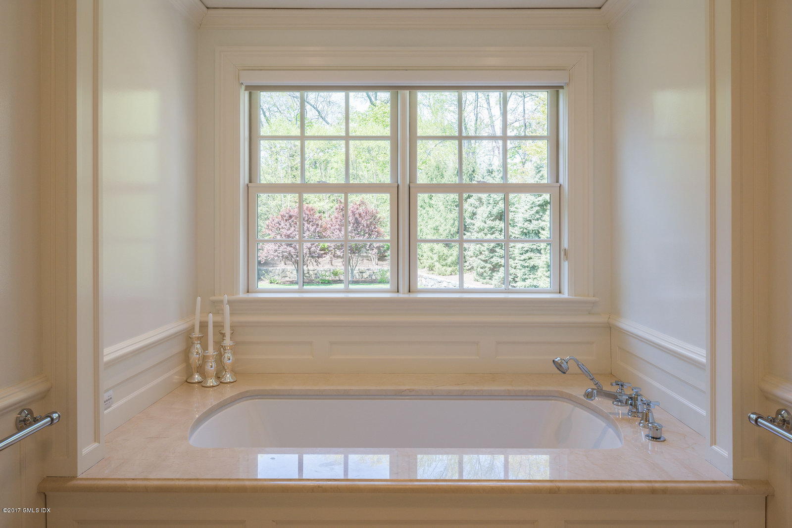 9 Roberta Lane Greenwich, CT 06830 - Photo 12 of 25 a bathroom with bathtub and window