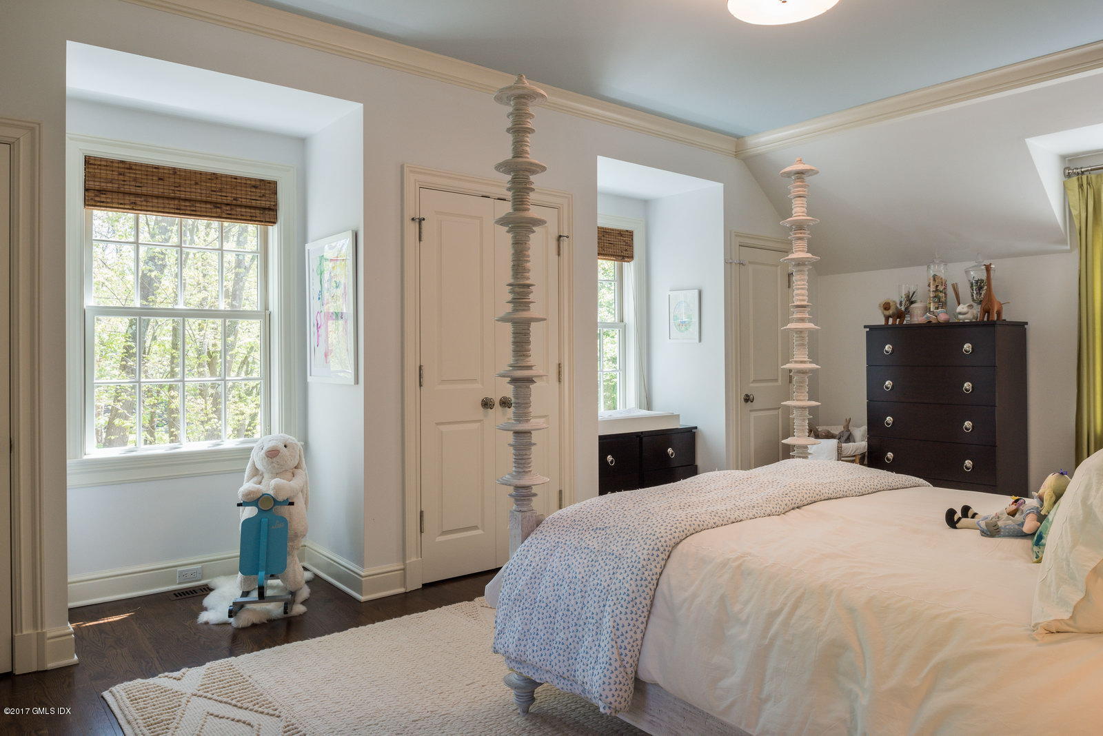 9 Roberta Lane Greenwich, CT 06830 - Photo 15 of 25 a bedroom with a bed and a closet