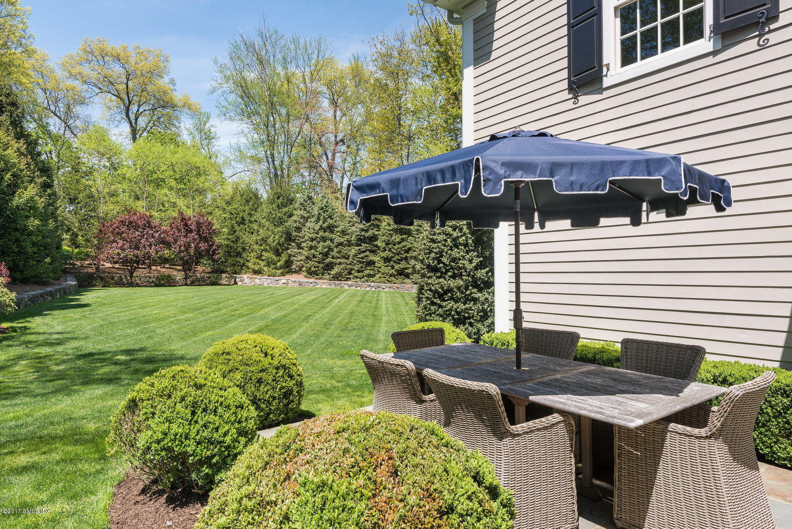 9 Roberta Lane Greenwich, CT 06830 - Photo 17 of 25 a view of a house with backyard and sitting area