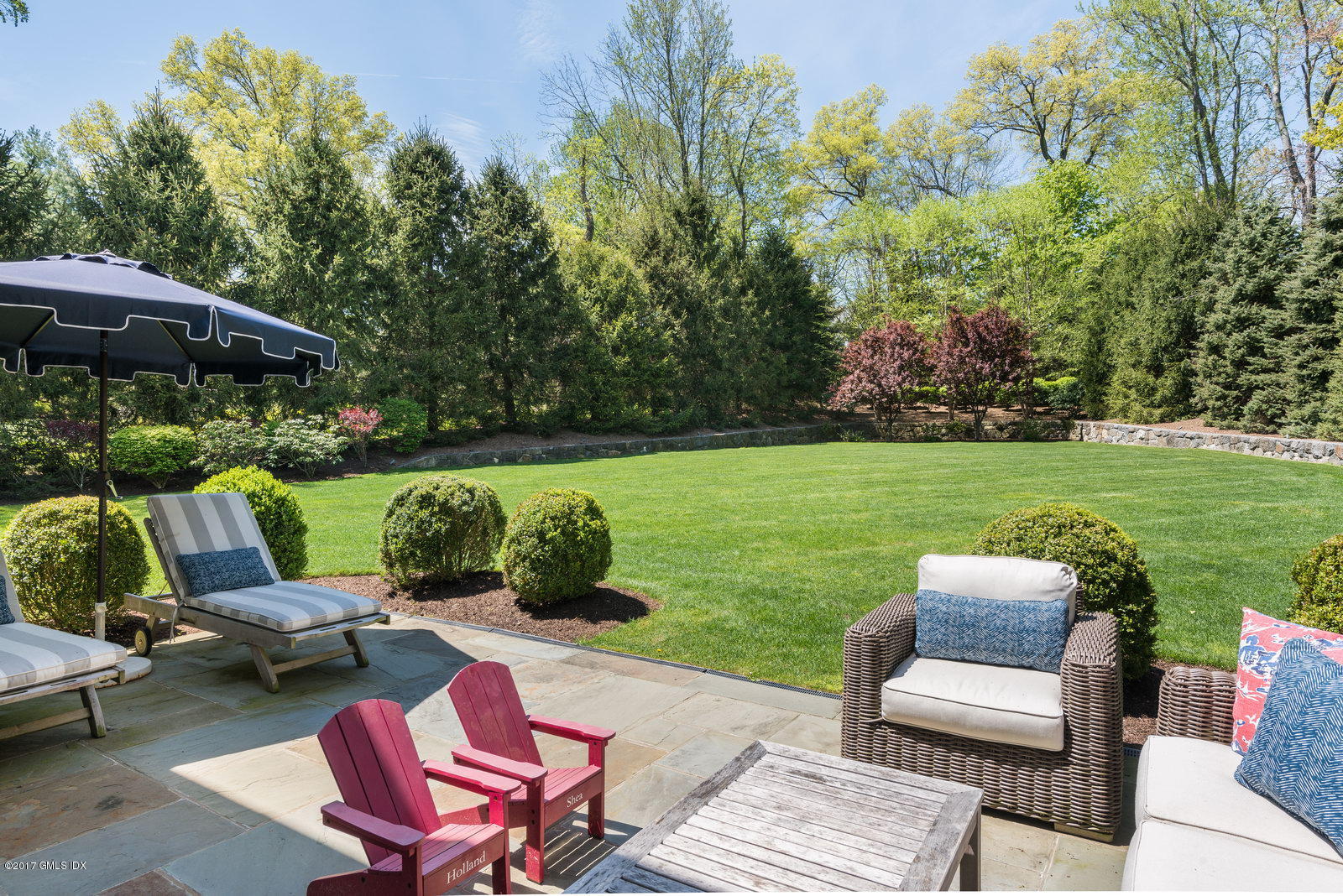 9 Roberta Lane Greenwich, CT 06830 - Photo 19 of 25 an outdoor sitting area with furniture and garden