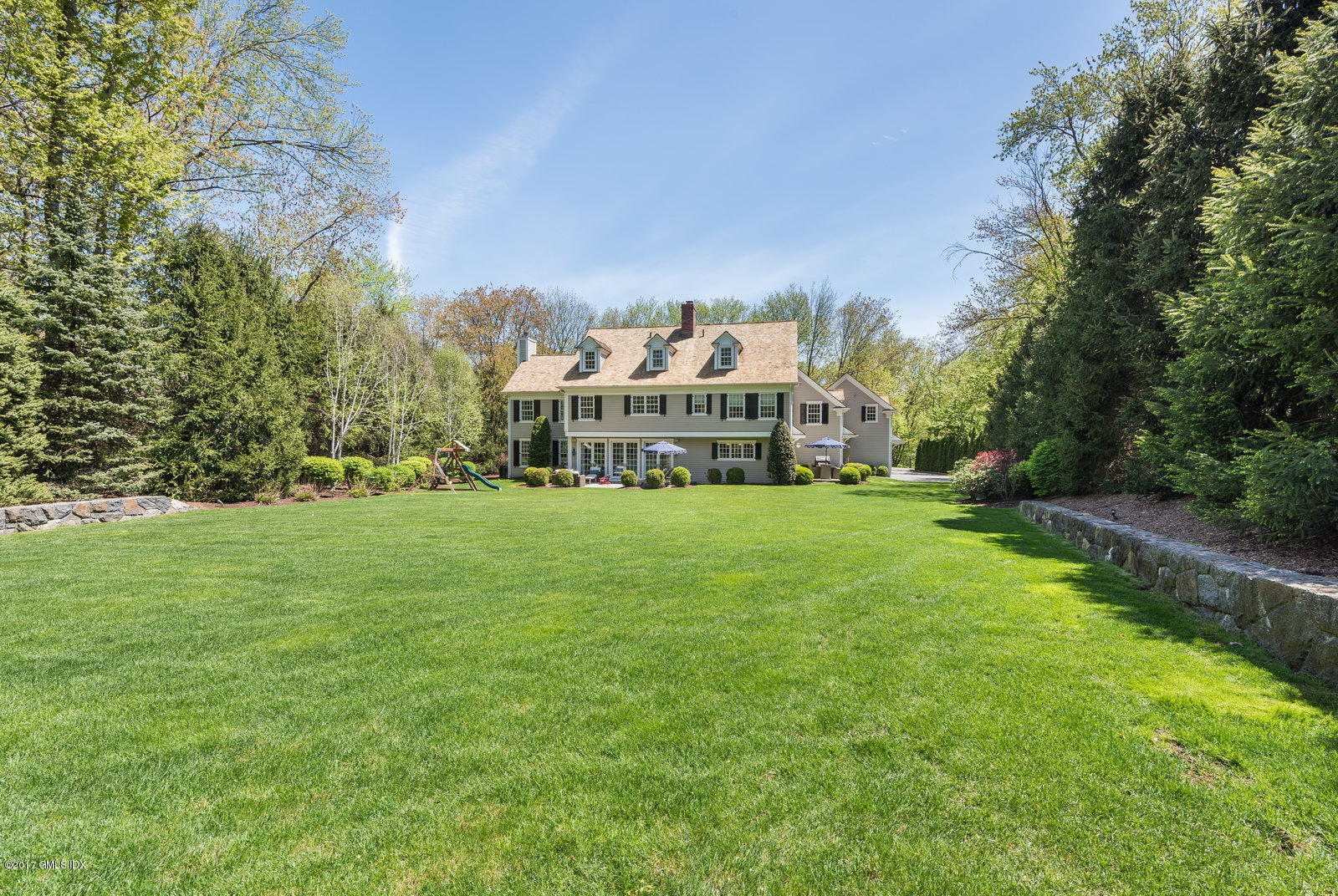 9 Roberta Lane Greenwich, CT 06830 - Photo 20 of 25 a view of house with a big yard