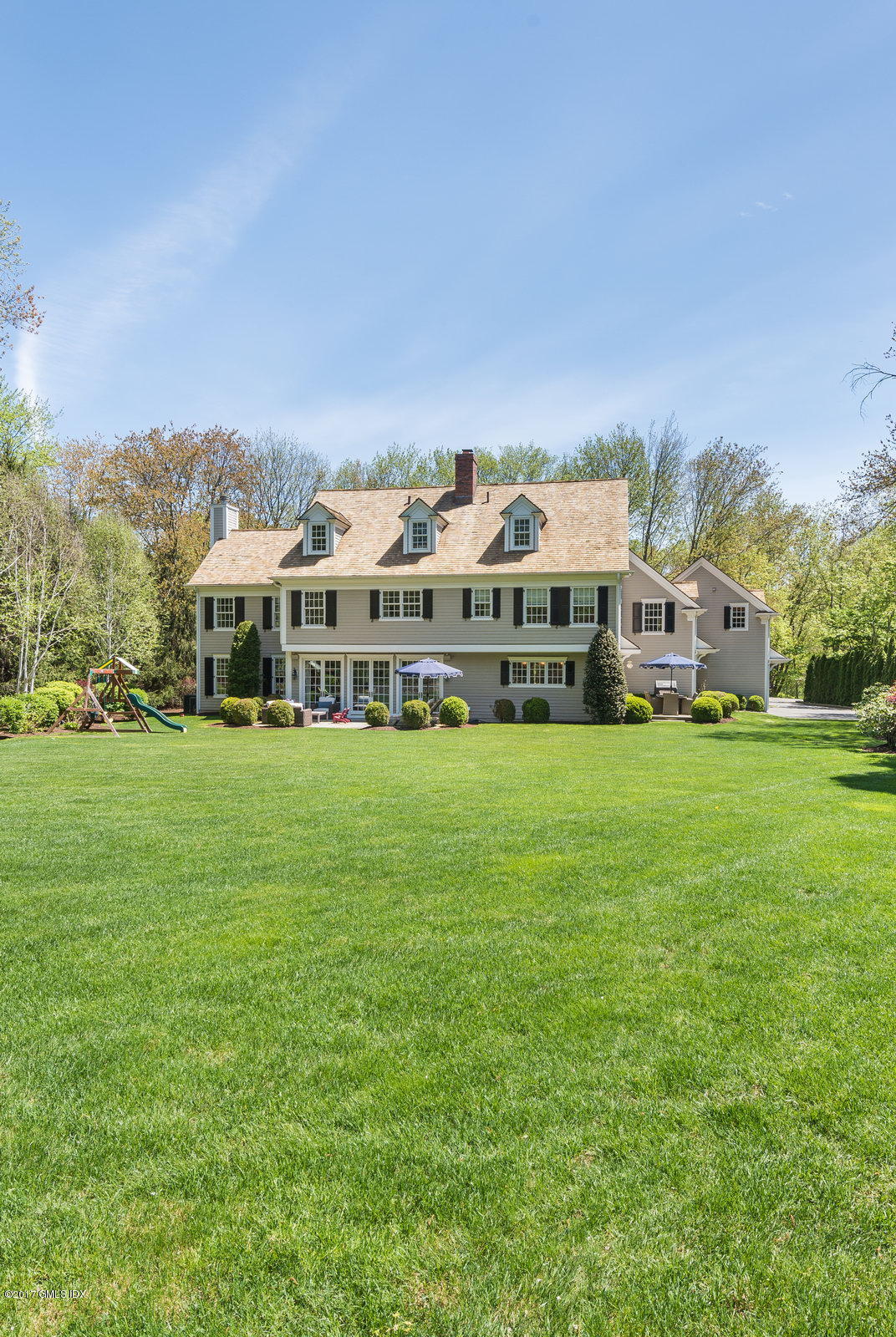 9 Roberta Lane Greenwich, CT 06830 - Photo 21 of 25 a view of a house with a big yard