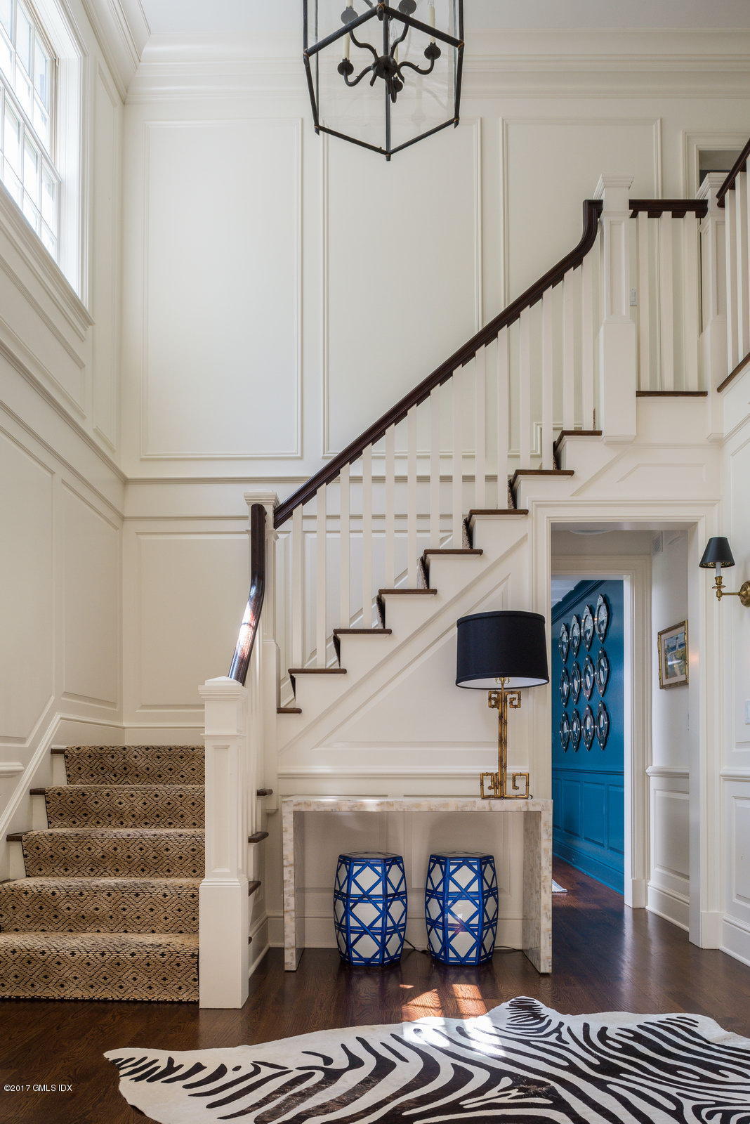 9 Roberta Lane Greenwich, CT 06830 - Photo 4 of 25 a view of entryway and hall with wooden floor