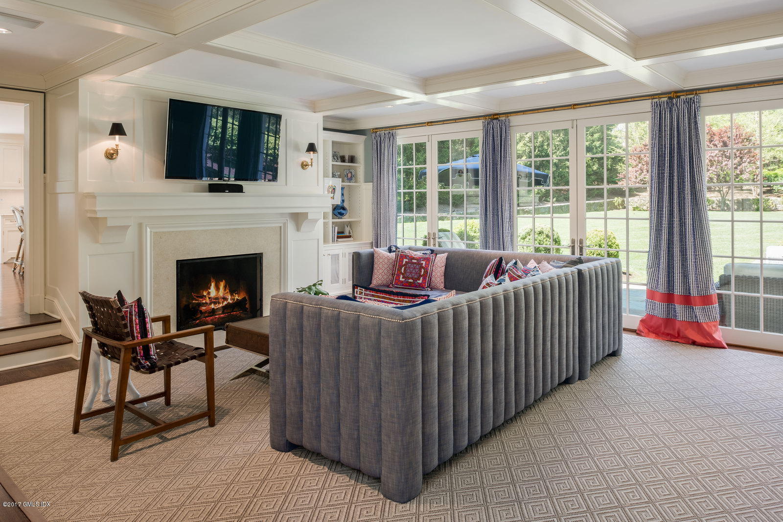 9 Roberta Lane Greenwich, CT 06830 - Photo 8 of 25 a living room with furniture and a fireplace
