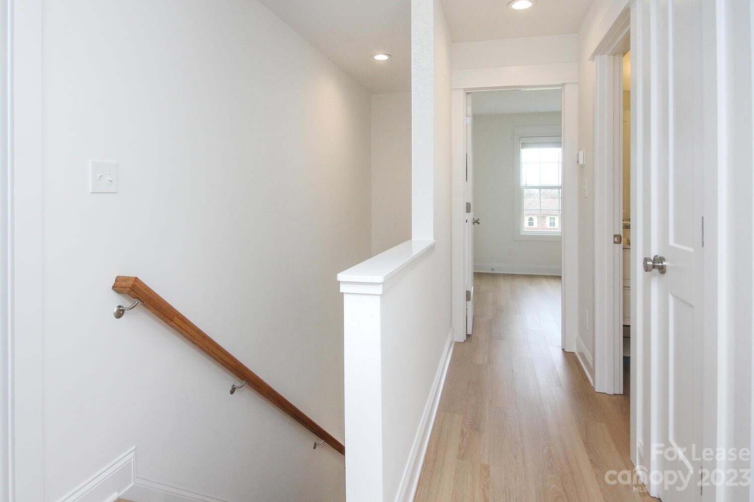 1082 Startown Road Lincolnton, NC 28092 - Photo 21 of 48 a view of a hallway with wooden floor