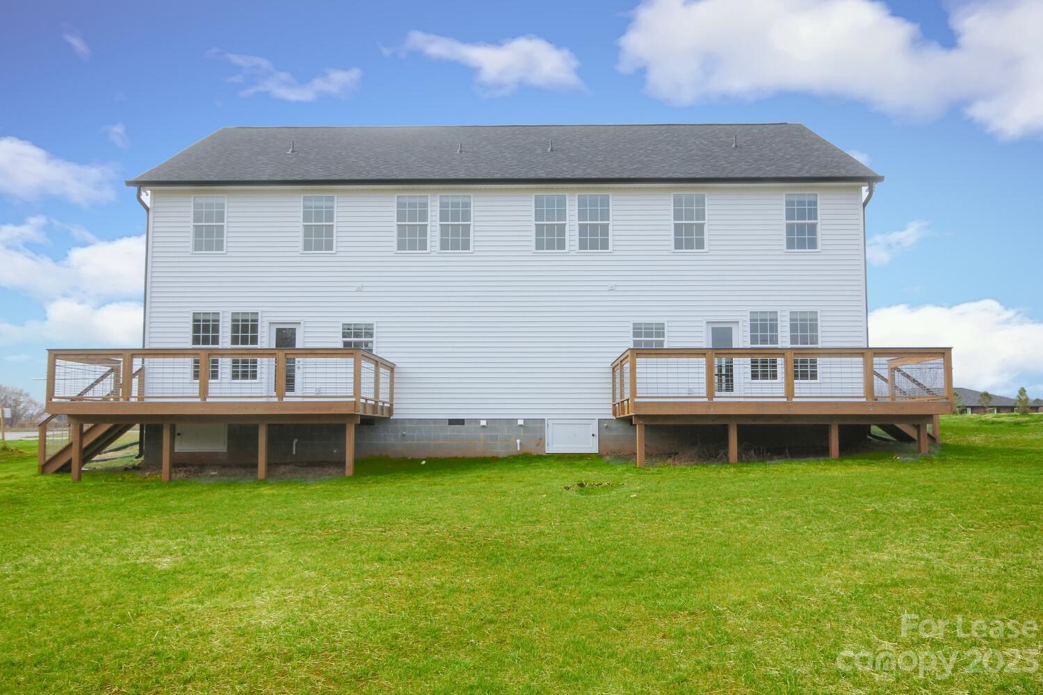 1082 Startown Road Lincolnton, NC 28092 - Photo 44 of 48 a backyard of a house with table and chairs