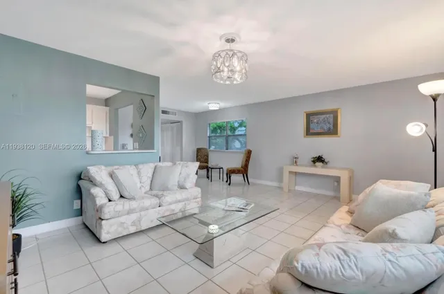 a living room with furniture and a couch