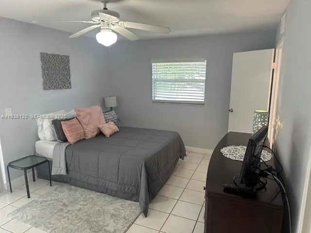 a bathroom with a sink a mirror and a toilet