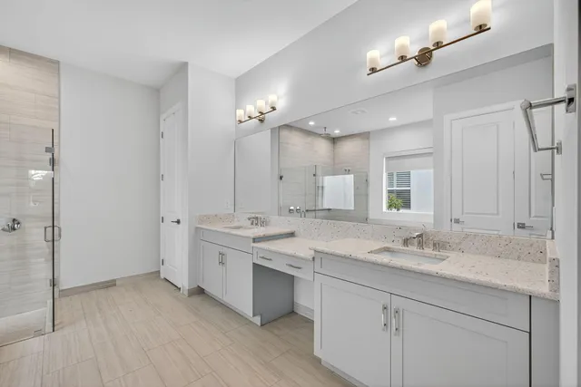 an aerial view of a house with a garden