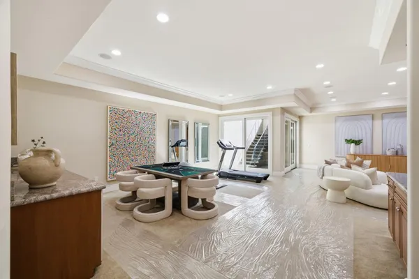 a bathroom with a granite countertop sink a mirror and a window