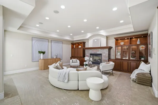 a room with a chair and a mirror