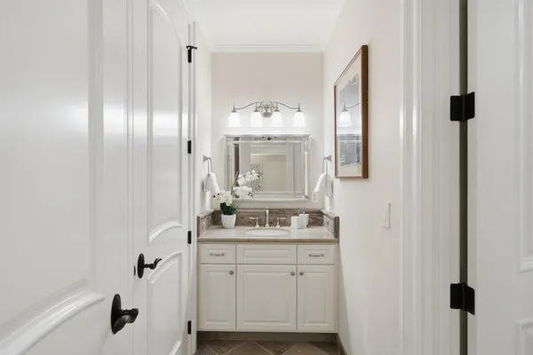 a kitchen with stainless steel appliances granite countertop a stove and a refrigerator