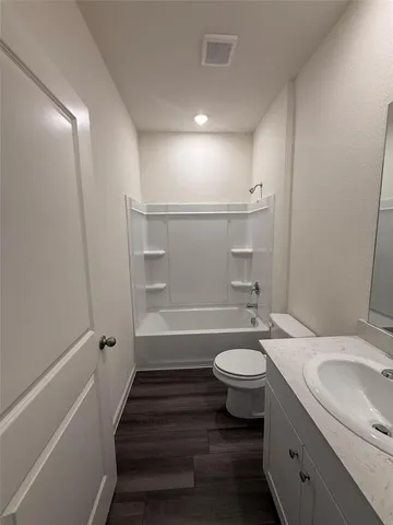 a kitchen with stainless steel appliances granite countertop a sink stove and oven