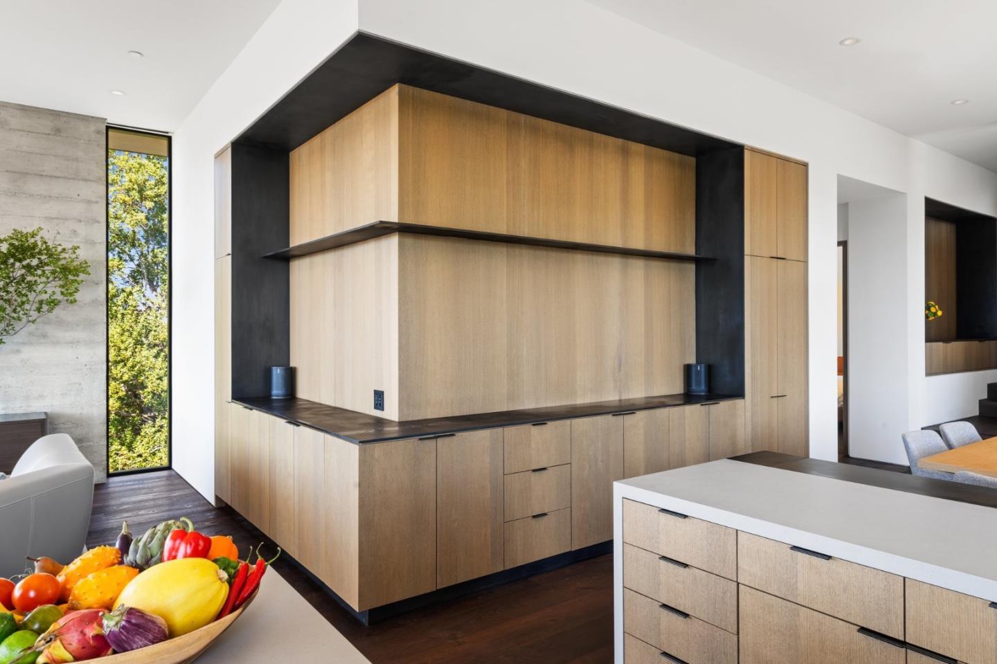16951 Bohlman Road Saratoga, CA 95070 - Photo 17 of 48 a bathroom with a sink a vanity and mirror
