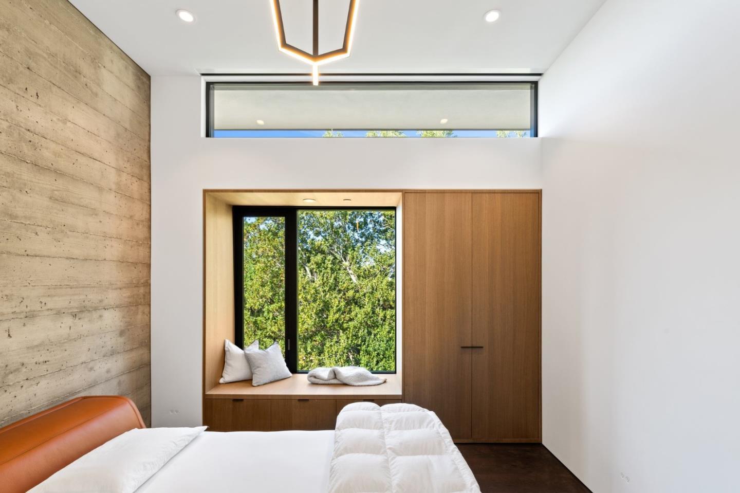 16951 Bohlman Road Saratoga, CA 95070 - Photo 27 of 48 a bedroom with a bed and a window