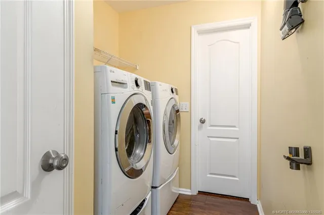 a utility room with dryer and washer