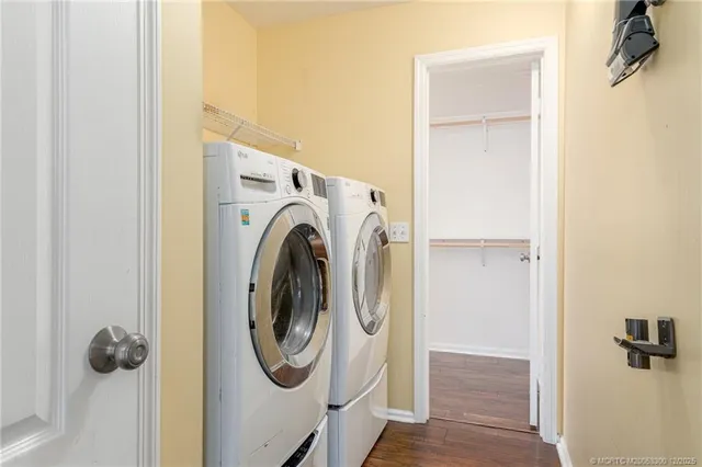 a utility room with dryer and washer