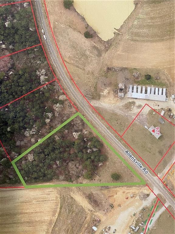 2.63-acres Allensville Road Roxboro, NC 27574 - Photo 1 of 4 a view of a back yard of a building