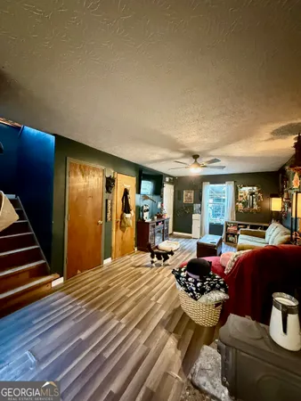 a room with furniture or couch and a fireplace