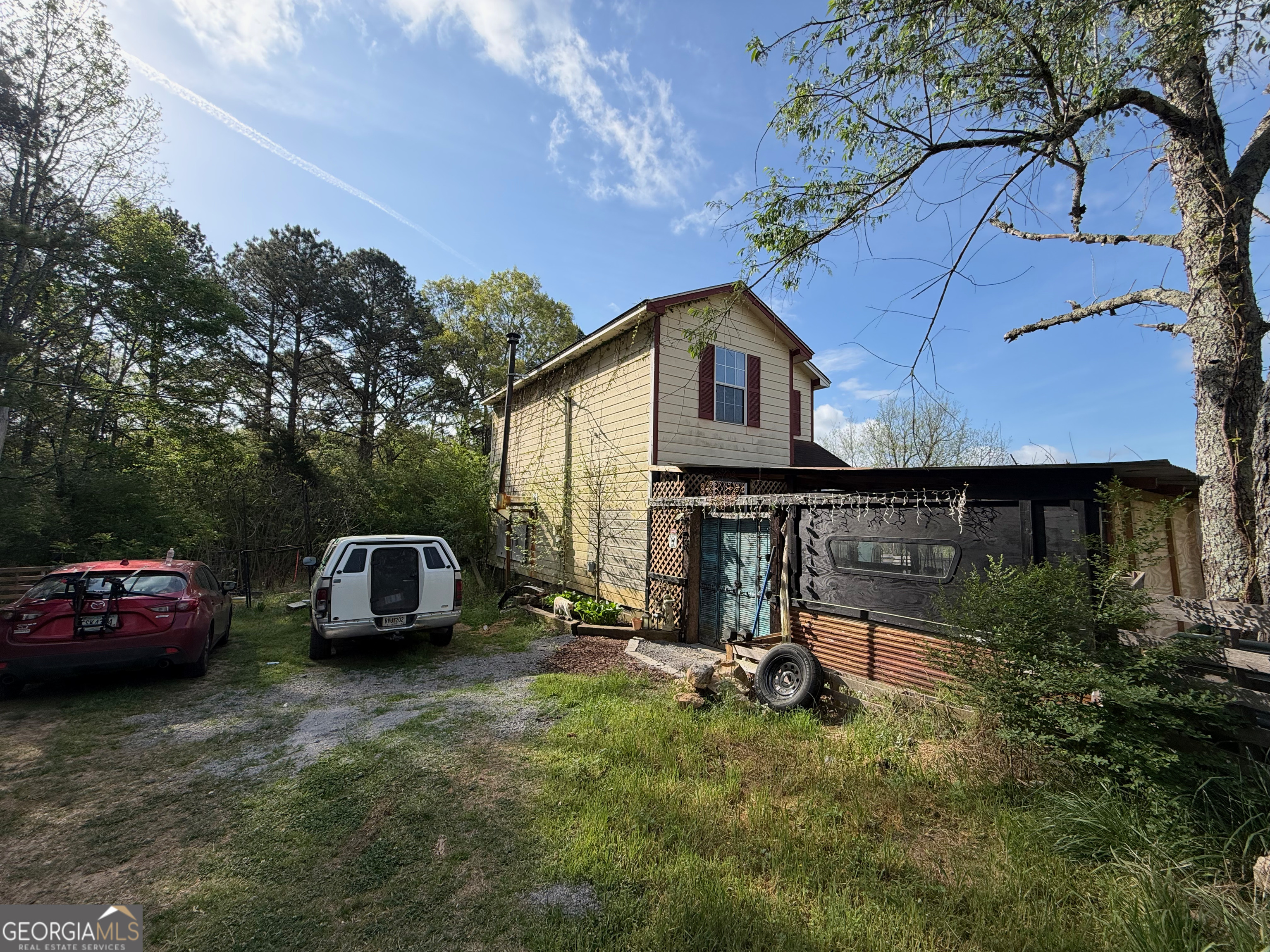 1449 Price Bridge Road Lyerly, GA 30730 - Photo 23 of 32 a house view with a garden space