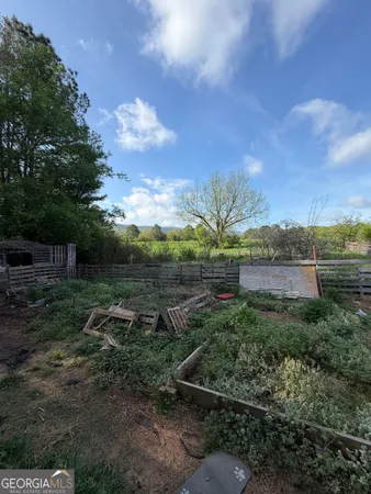 a view of a backyard with green space