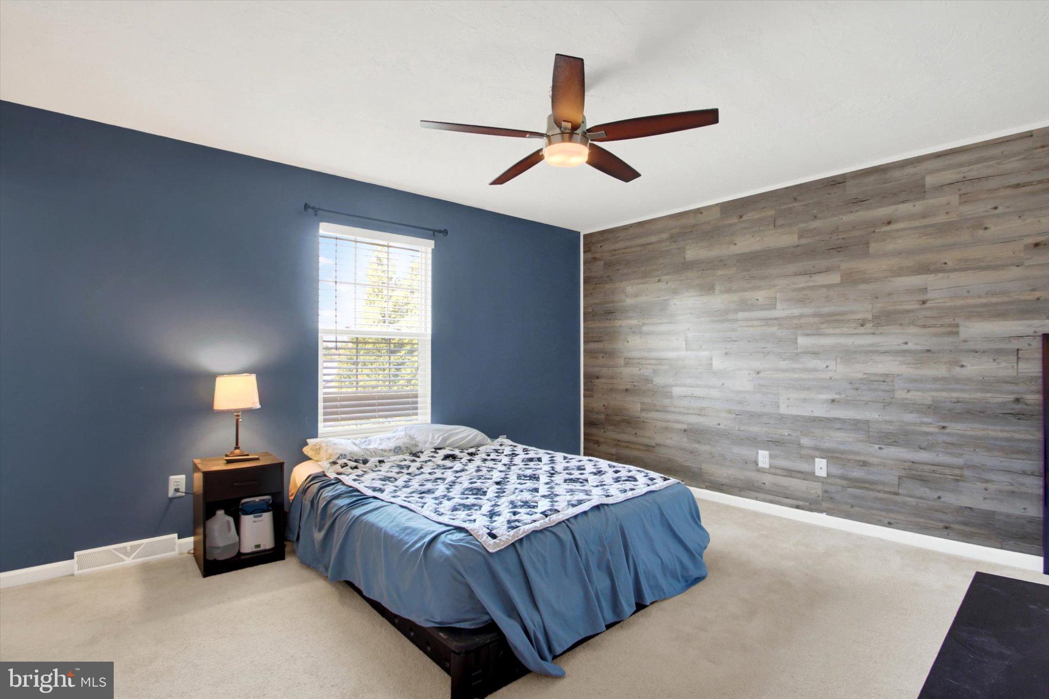 239 Race Horse Road Hanover, PA 17331 - Photo 12 of 24 Serene bedroom with stylish accents.