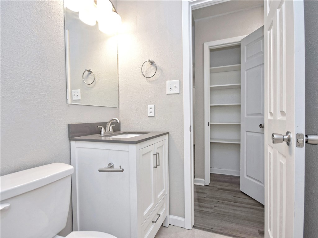 2302 Fuzz Fairway, Unit B Austin, TX 78728 - Photo 19 of 27 Hall Bath and linen closet.