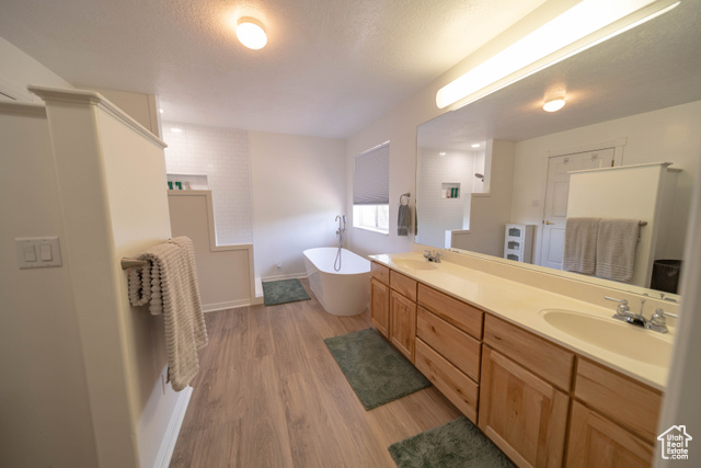 190 600 North Ferron, UT 84523 - Photo 30 of 85 Spa like bathroom off of primary suite. Large soak tub, separate shower, and custom built in storage