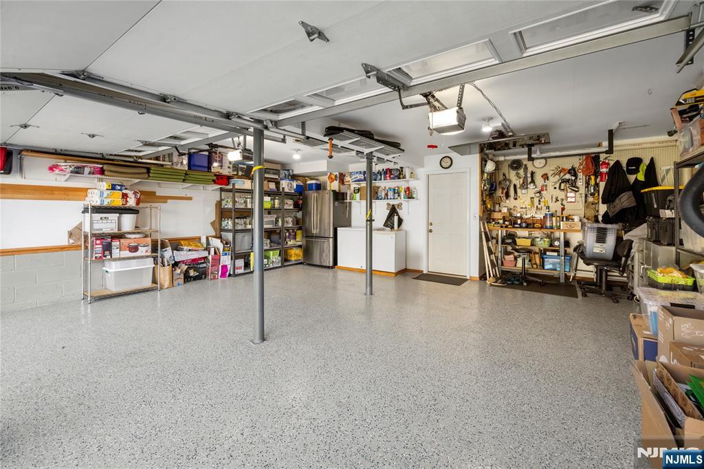 66 Roehrs Drive Wallington, NJ 07057 - Photo 30 of 37 a view of a storage room with a garage