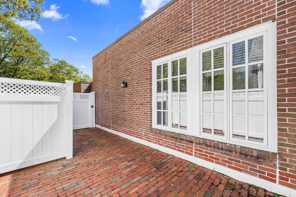 63 Garden Road, Unit C5 Wellesley, MA 02481 - Photo 24 of 30 a view of a house with a wooden deck